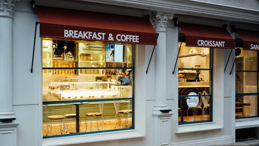 pexels-photo-30855411-30855411 A cozy café with inviting window displays offering breakfast and coffee. Perfect for a morning treat.